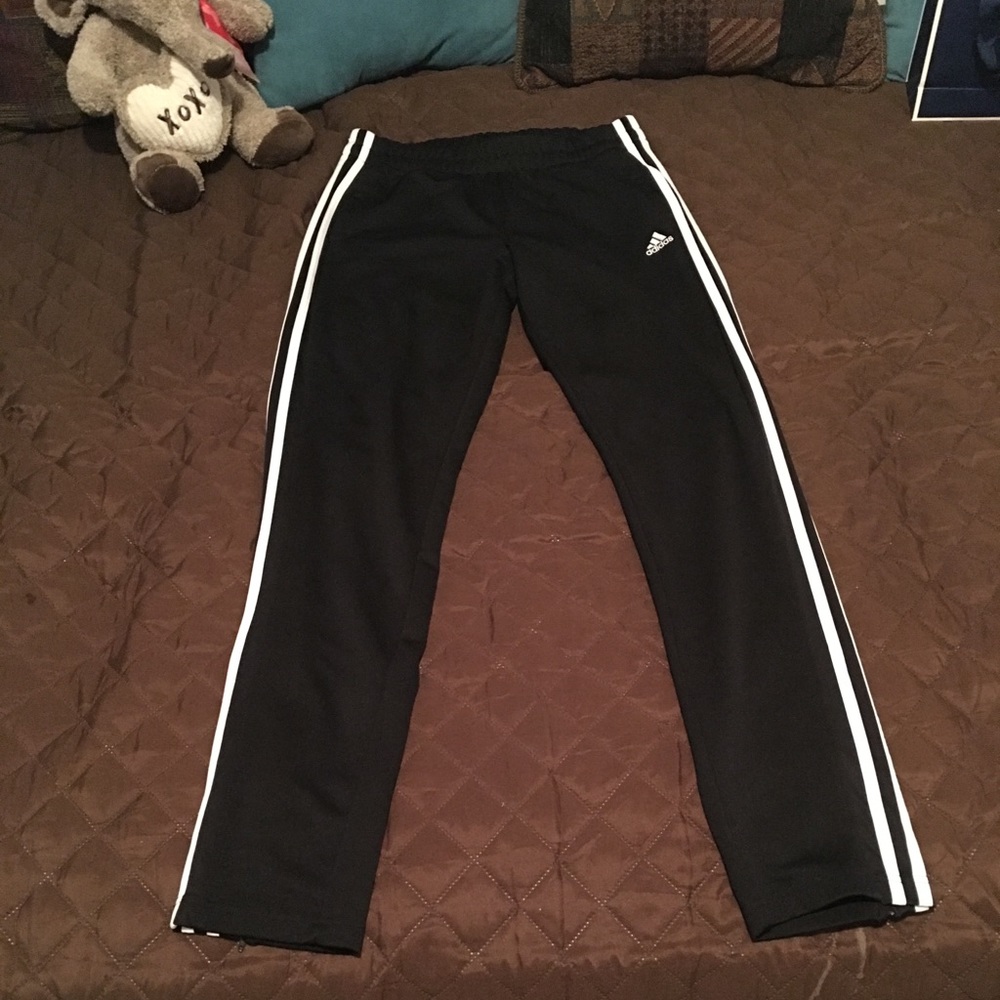 Adidas track pants.